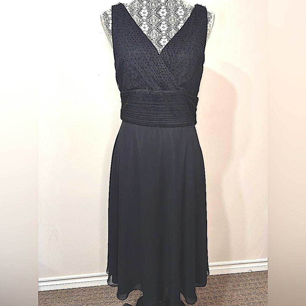 Gorgeous Patra v front dress with draping, ruching, pleating and sheer overlay